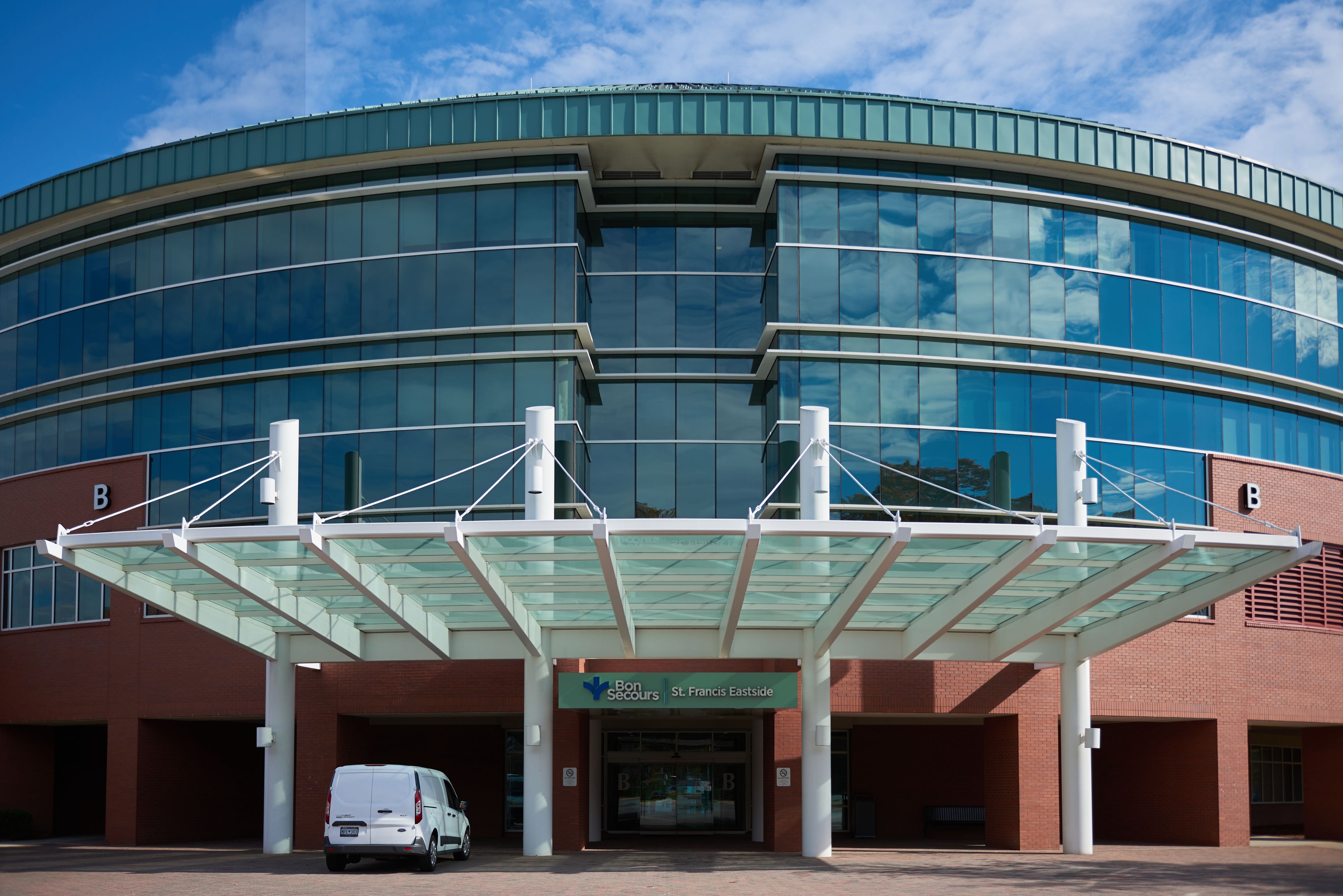 Entrance to the St. Francis Eastside Hospital . Double sliding doors with glass awning