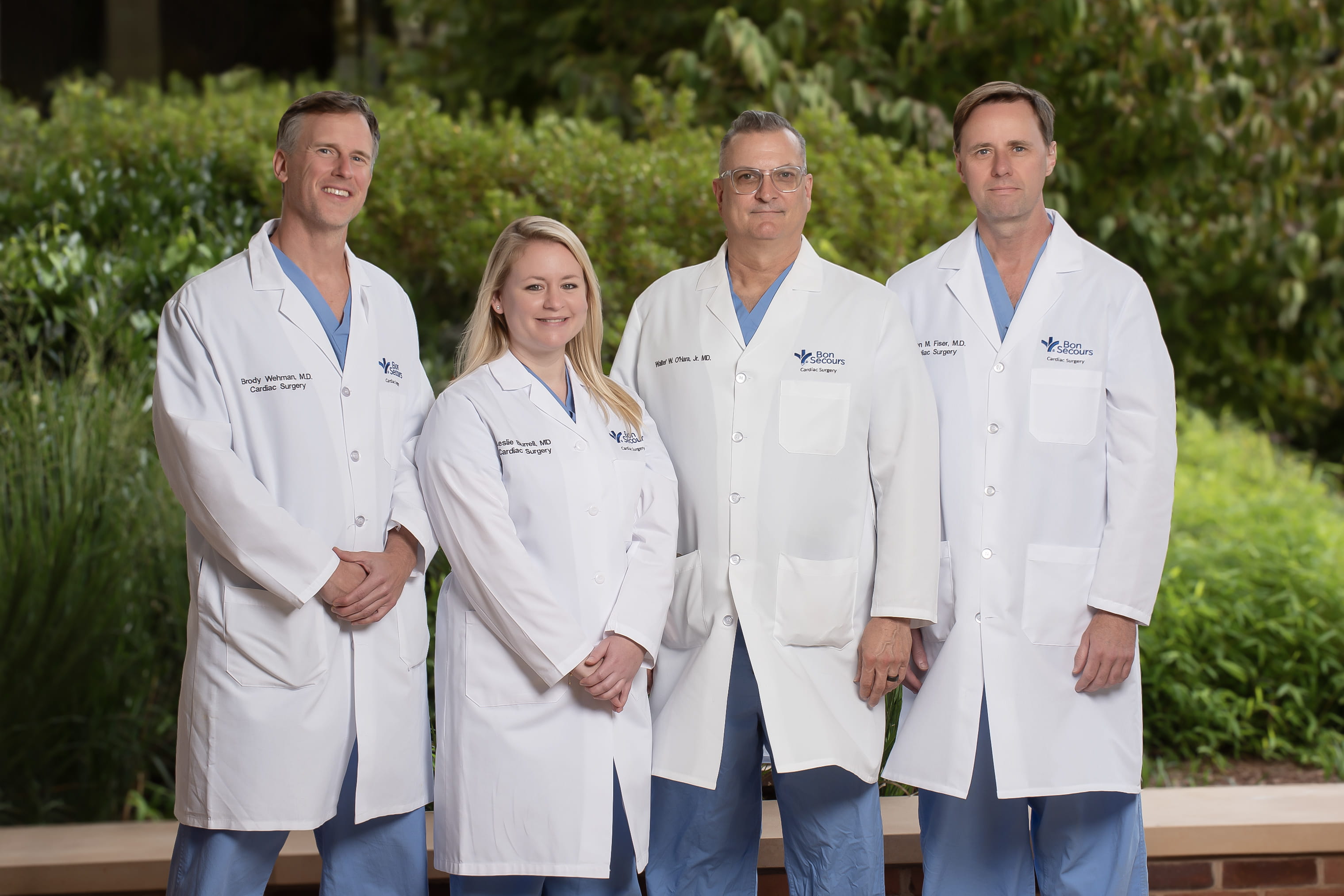 surgical team at Bon Secours Cardiac Surgery team poses outside of their practice