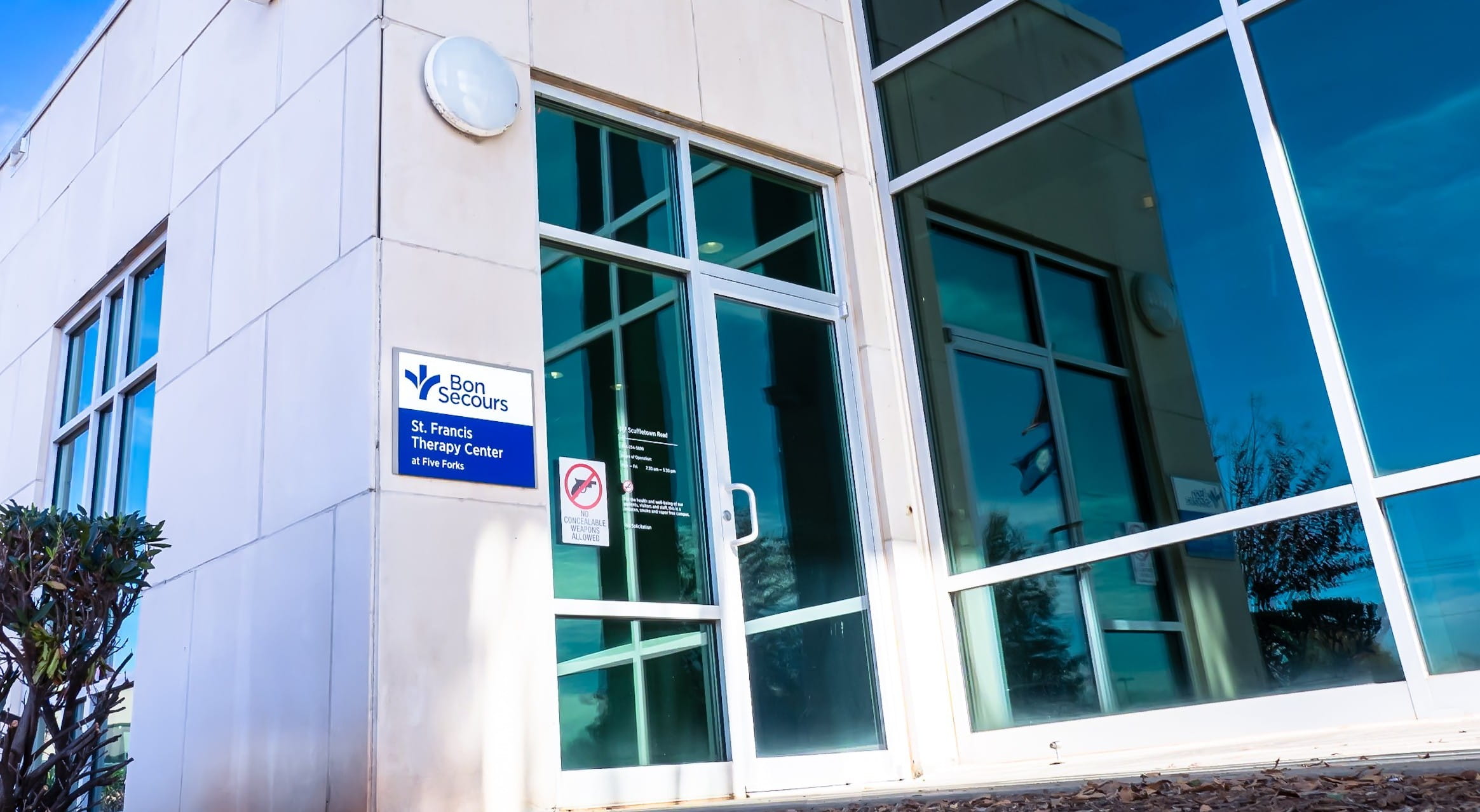 Entrance to facility with Bon Secour sign.