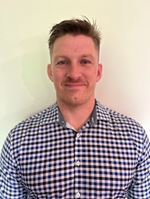 Eric MacPherson is a clinical pharmacist at Memorial Regional Medical Center. Male checkered shirt.