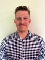 Eric MacPherson is a clinical pharmacist at Memorial Regional Medical Center. Male checkered shirt.